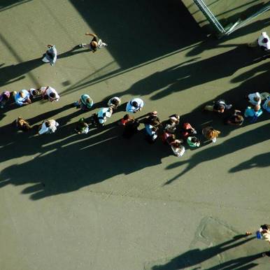 birdseye view of people in queue