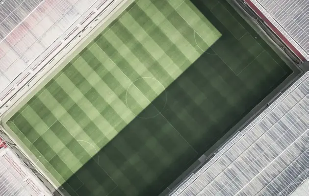 Aerial view of football pitch loading=