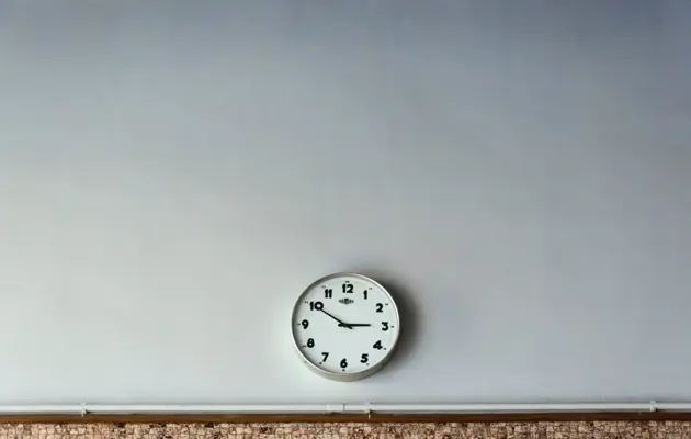 Clock on a wall loading=