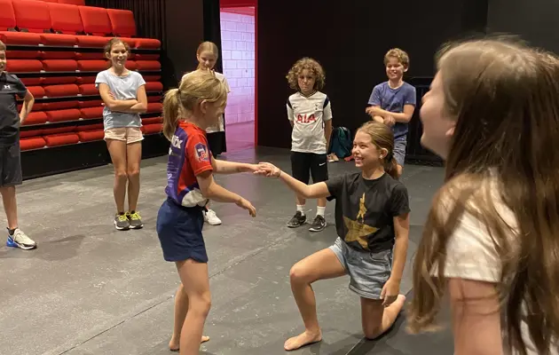kids performing on stage
